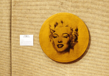 Louise Lawler’s yellowy dye-destruction print of Warhol’s “Round Marilyn”