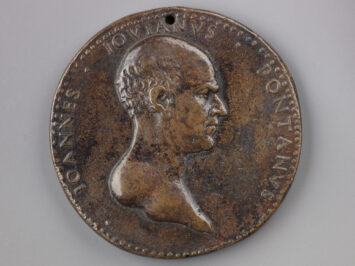 An image of an old coin.
